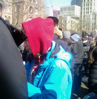 Passing around the burning sage at Queens Park